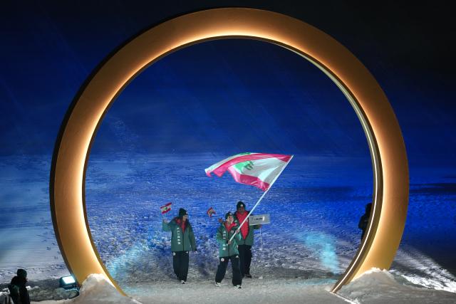 (260207) -- LIVIGNO, Feb. 7, 2026 (Xinhua) -- Members of the delegation of Lebanon attend the parade of athletes during the opening ceremony of the Milan-Cortina 2026 Olympic Winter Games in Livigno, Italy, Feb. 6, 2026. (Xinhua/Xia Yifang)