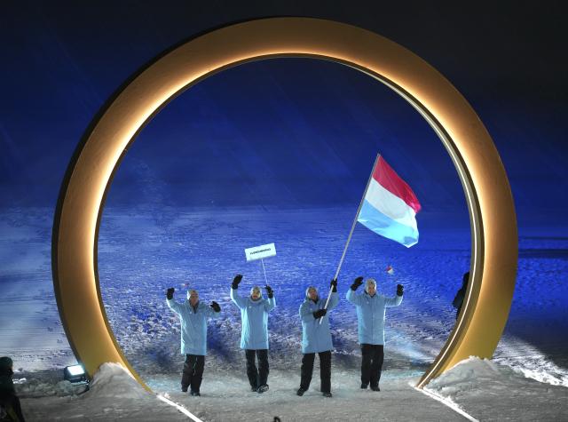 (260207) -- LIVIGNO, Feb. 7, 2026 (Xinhua) -- Members of the delegation of Luxembourg attend the parade of athletes during the opening ceremony of the Milan-Cortina 2026 Olympic Winter Games in Livigno, Italy, Feb. 6, 2026. (Xinhua/Xia Yifang)