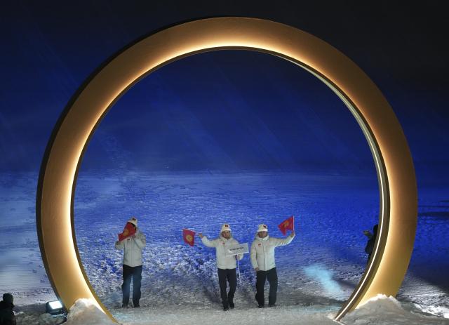 (260207) -- LIVIGNO, Feb. 7, 2026 (Xinhua) -- Members of the delegation of Kyrgyzstan attend the parade of athletes during the opening ceremony of the Milan-Cortina 2026 Olympic Winter Games in Livigno, Italy, Feb. 6, 2026. (Xinhua/Xia Yifang)