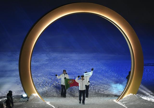 (260207) -- LIVIGNO, Feb. 7, 2026 (Xinhua) -- Members of the delegation of Portugal attend the parade of athletes during the opening ceremony of the Milan-Cortina 2026 Olympic Winter Games in Livigno, Italy, Feb. 6, 2026. (Xinhua/Xia Yifang)