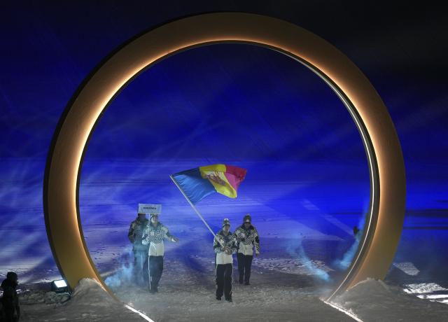 (260207) -- LIVIGNO, Feb. 7, 2026 (Xinhua) -- Members of the delegation of Andorra attend the parade of athletes during the opening ceremony of the Milan-Cortina 2026 Olympic Winter Games in Livigno, Italy, Feb. 6, 2026. (Xinhua/Xia Yifang)