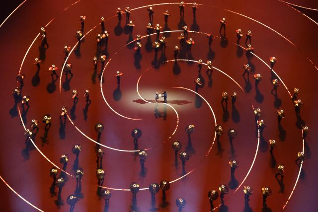 (260207) -- MILAN, Feb. 7, 2026 (Xinhua) -- Artists perform during the opening ceremony of the Milan-Cortina 2026 Olympic Winter Games at the San Siro Olympic Stadium in Milan, Italy, Feb. 6, 2026. (Xinhua/Chen Yichen)