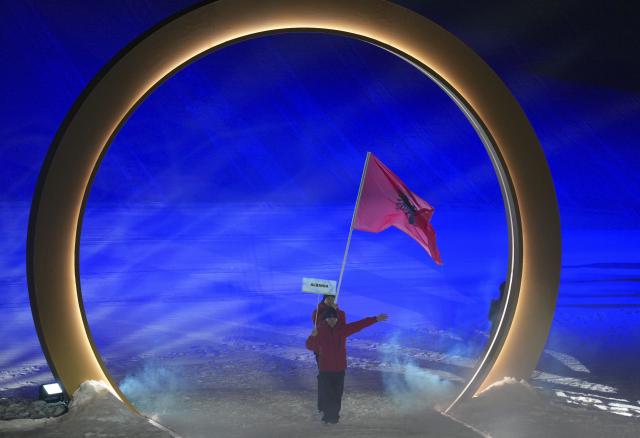 (260207) -- LIVIGNO, Feb. 7, 2026 (Xinhua) -- Members of the delegation of Albania attend the parade of athletes during the opening ceremony of the Milan-Cortina 2026 Olympic Winter Games in Livigno, Italy, Feb. 6, 2026. (Xinhua/Xia Yifang)