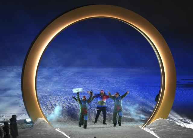 (260207) -- LIVIGNO, Feb. 7, 2026 (Xinhua) -- Members of the delegation of Haiti attend the parade of athletes during the opening ceremony of the Milan-Cortina 2026 Olympic Winter Games in Livigno, Italy, Feb. 6, 2026. (Xinhua/Xia Yifang)