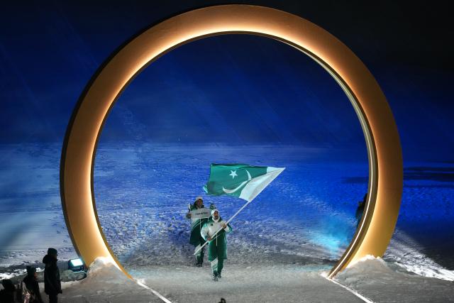 (260207) -- LIVIGNO, Feb. 7, 2026 (Xinhua) -- Members of the delegation of Pakistan attend the parade of athletes during the opening ceremony of the Milan-Cortina 2026 Olympic Winter Games in Livigno, Italy, Feb. 6, 2026. (Xinhua/Xia Yifang)