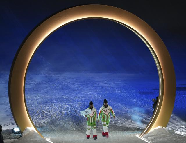 (260207) -- LIVIGNO, Feb. 7, 2026 (Xinhua) -- Members of the delegation of Iran attend the parade of athletes during the opening ceremony of the Milan-Cortina 2026 Olympic Winter Games in Livigno, Italy, Feb. 6, 2026. (Xinhua/Xia Yifang)