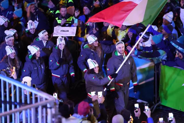 (260207) -- CORTINA D'AMPEZZO, Feb. 7, 2026 (Xinhua) -- Members of the delegation of Italy attend the parade of athletes during the opening ceremony of the Milan-Cortina 2026 Olympic Winter Games in Cortina, Italy, Feb. 6, 2026. (Xinhua/Ding Xu)
