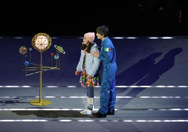 (260207) -- MILAN, Feb. 7, 2026 (Xinhua) -- Artists perform during the opening ceremony of the Milan-Cortina 2026 Olympic Winter Games at the San Siro Olympic Stadium in Milan, Italy, Feb. 6, 2026. (Xinhua/Wang Kaiyan)
