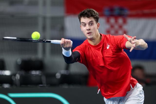 (260207) -- VARAZDIN, Feb. 7, 2026 (Xinhua) -- Matej Dodig of Team Croatia hits a return in the fist match against Elmer Moeller of Team Denmark during the Davis Cup Qualifier first round match between Croatia and Denmark in Varazdin, Croatia, on Feb. 6, 2026. (Photo by Igor Kralj/PIXSELL via Xinhua)