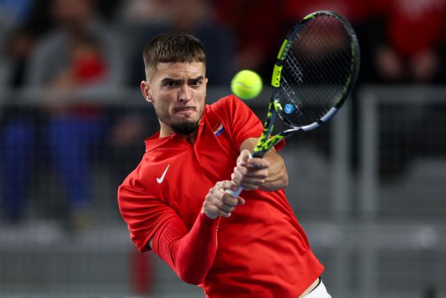 (260207) -- VARAZDIN, Feb. 7, 2026 (Xinhua) -- Dino Prizmic of Team Croatia hits a return in the second match against August Holmgren of Team Denmark during the Davis Cup Qualifier first round match between Croatia and Denmark in Varazdin, Croatia, on Feb. 6, 2026. (Photo by Igor Kralj/PIXSELL via Xinhua)