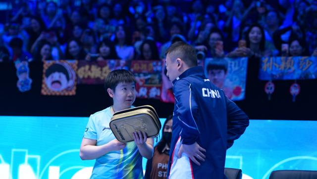 (260207) -- HAIKOU, Feb. 7, 2026 (Xinhua) -- Sun Yingsha (L) communicates with coach Ma Lin after the women's singles round of 16 match between Sun Yingsha of China and Kim Nayeong of South Korea at the ITTF-ATTU Asian Cup Haikou 2026 table tennis tournament in Haikou, south China's Hainan Province, Feb. 7, 2026. (Xinhua/Yang Guanyu)