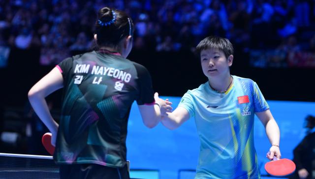 (260207) -- HAIKOU, Feb. 7, 2026 (Xinhua) -- Sun Yingsha (R) greets Kim Nayeong after the women's singles round of 16 match between Sun Yingsha of China and Kim Nayeong of South Korea at the ITTF-ATTU Asian Cup Haikou 2026 table tennis tournament in Haikou, south China's Hainan Province, Feb. 7, 2026. (Xinhua/Yang Guanyu)