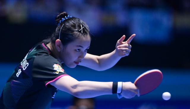 (260207) -- HAIKOU, Feb. 7, 2026 (Xinhua) -- Kim Nayeong hits a return during the women's singles round of 16 match between Sun Yingsha of China and Kim Nayeong of South Korea at the ITTF-ATTU Asian Cup Haikou 2026 table tennis tournament in Haikou, south China's Hainan Province, Feb. 7, 2026. (Xinhua/Yang Guanyu)
