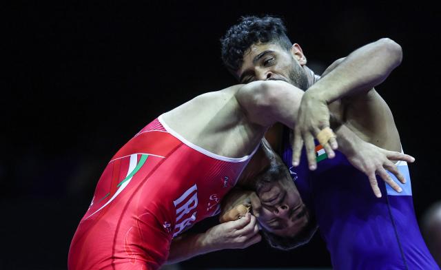 (260207) -- ZAGREB, Feb. 7, 2026 (Xinhua) -- Erfan Behnam Jarkani of Iran (L) competes against Chetan Chetan of India during UWW Grand Prix Ranking Series Zagreb Open 2026 Men's Greco-Roman 63kg weight class gold medal match in Zagreb, Croatia, Feb. 6, 2026. (Photo by Slavko Midzor/PIXSELL via Xinhua)