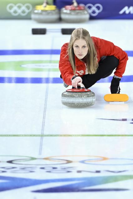 (260207) -- CORTINA D'AMPEZZO, Feb. 7, 2026 (Xinhua) -- Briar Schwaller-Huerlimann of Switzerland competes during the curling mixed doubles round robin session 7 match between Switzerland and Sweden of the 2026 Milan-Cortina Winter Olympics in Cortina D'Ampezzo, Italy, Feb. 7, 2026. (Xinhua/Lian Yi)