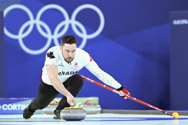 (260207) -- CORTINA D'AMPEZZO, Feb. 7, 2026 (Xinhua) -- Brett Gallant of Canada competes during the curling mixed doubles round robin session 7 match between Britain and Canada of the 2026 Milan-Cortina Winter Olympics in Cortina D'Ampezzo, Italy, Feb. 7, 2026. (Xinhua/Lian Yi)