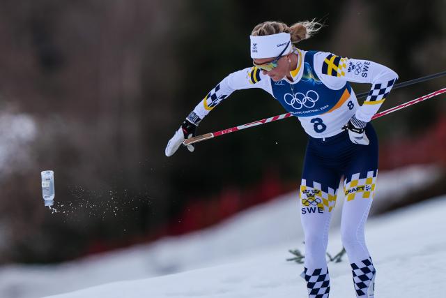 (260207) -- TESERO, Feb. 7, 2026 (Xinhua) -- Frida Karlsson of Sweden competes during the Cross-Country Skiing Women's 10km+10km Skiathlon of the Milan-Cortina 2026 Olympic Winter Games in Tesero, Italy, Feb. 7, 2026. (Xinhua/Peng Ziyang)