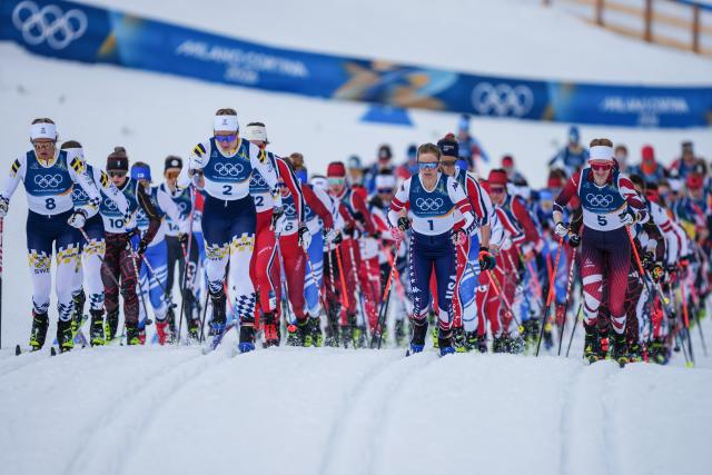 (260207) -- TESERO, Feb. 7, 2026 (Xinhua) -- Athletes compete during the Cross-Country Skiing Women's 10km+10km Skiathlon of the Milan-Cortina 2026 Olympic Winter Games in Tesero, Italy, Feb. 7, 2026. (Xinhua/Peng Ziyang)