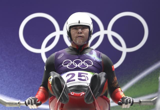 (260207) -- CORTINA D'AMPEZZO, Feb. 7, 2026 (Xinhua) Bao Zhenyu of China competes during the luge men's singles at the Milan-Cortina 2026 Olympic Winter Games in Cortina, Italy, Feb. 7, 2026. (Xinhua/Ding Xu)