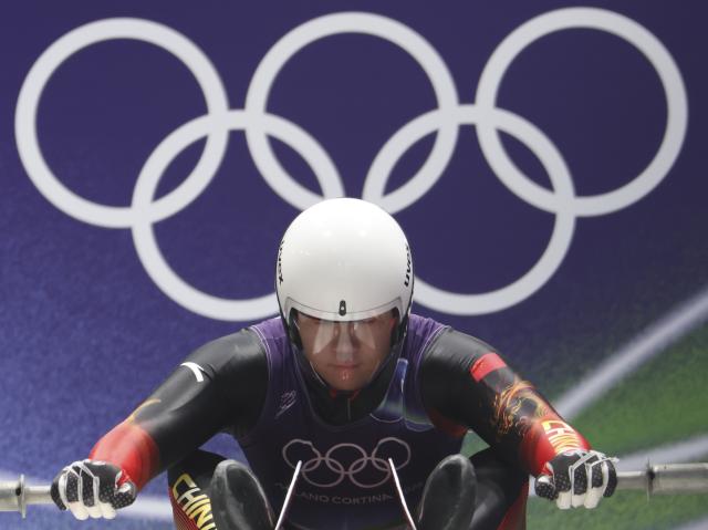 (260207) -- CORTINA D'AMPEZZO, Feb. 7, 2026 (Xinhua) Bao Zhenyu of China competes during the luge men's singles at the Milan-Cortina 2026 Olympic Winter Games in Cortina, Italy, Feb. 7, 2026. (Xinhua/Ding Xu)
