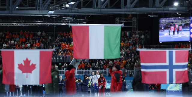 (260207) -- MILAN, Feb. 7, 2026 (Xinhua) -- Gold medalist Francesca Lollobrigida of Italy, silver medalist Ragne Wiklund of Norway and bronze medalist Valerie Maltais of Canada attend the awarding ceremony of the speed skating women's 3000m at the Milan-Cortina 2026 Olympic Winter Games in Milan, Italy, Feb. 7, 2026. (Xinhua/Li Jing)