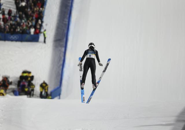 (260207) -- PREDAZZO, Feb. 7, 2026 (Xinhua) -- Weng Yangning of China competes during the ski jumping women's normal hill individual at the Milan-Cortina 2026 Olympic Winter Games in Predazzo, Italy, Feb. 7, 2026. (Xinhua/Huang Wei)