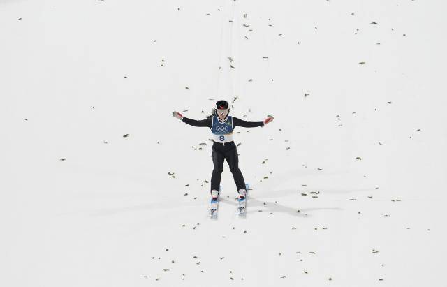 (260208) -- PULEIDAZUO, Feb. 7, 2026 (Xinhua) -- Weng Yangning of China competes during the trial round of the ski jumping women's normal hill individual at the Milan-Cortina 2026 Olympic Winter Games in Predazzo, Italy, Feb. 7, 2026. (Xinhua/Meng Yongmin)