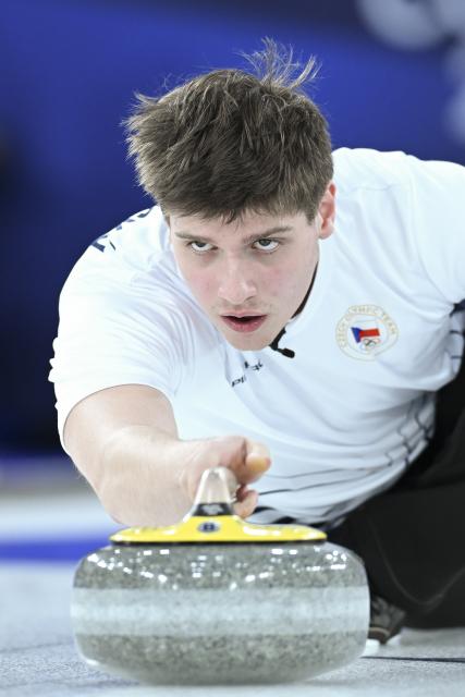 (260207) -- CORTINA D'AMPEZZO, Feb. 7, 2026 (Xinhua) -- Vit Chabicovsky of the Czech Republic competes during the curling mixed doubles round robin session 8 match between Sweden and Norway of the 2026 Milan-Cortina Winter Olympics in Cortina D'Ampezzo, Italy, Feb. 7, 2026. (Xinhua/Lian Yi)
