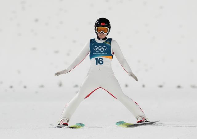 (260207) -- PREDAZZO, Feb. 7, 2026 (Xinhua) -- Liu Qi of China competes during the ski jumping women's normal hill individual at the Milan-Cortina 2026 Olympic Winter Games in Predazzo, Italy, Feb. 7, 2026. (Xinhua/Meng Yongmin)
