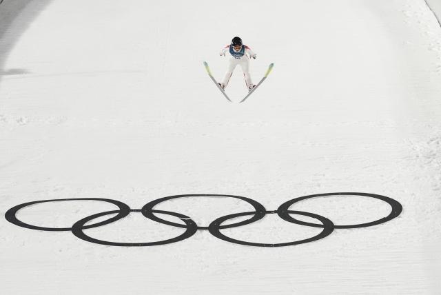 (260208) -- PULEIDAZUO, Feb. 7, 2026 (Xinhua) -- Liu Qi of China competes during the trial round of the ski jumping women's normal hill individual at the Milan-Cortina 2026 Olympic Winter Games in Predazzo, Italy, Feb. 7, 2026. (Xinhua/Meng Yongmin)
