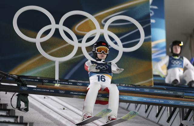 (260207) -- PREDAZZO, Feb. 7, 2026 (Xinhua) -- Liu Qi of China competes during the ski jumping women's normal hill individual at the Milan-Cortina 2026 Olympic Winter Games in Predazzo, Italy, Feb. 7, 2026. (Xinhua/Huang Wei)