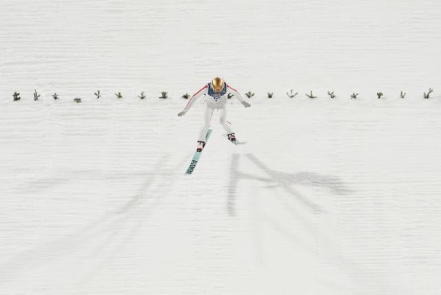 (260207) -- PREDAZZO, Feb. 7, 2026 (Xinhua) -- Zeng Ping of China competes during the ski jumping women's normal hill individual at the Milan-Cortina 2026 Olympic Winter Games in Predazzo, Italy, Feb. 7, 2026. (Xinhua/Meng Yongmin)