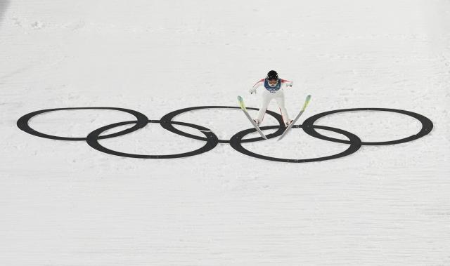 (260208) -- PULEIDAZUO, Feb. 7, 2026 (Xinhua) -- Liu Qi of China competes during the trial round of the ski jumping women's normal hill individual at the Milan-Cortina 2026 Olympic Winter Games in Predazzo, Italy, Feb. 7, 2026. (Xinhua/Meng Yongmin)