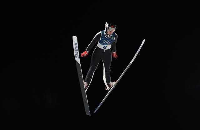 (260207) -- PREDAZZO, Feb. 7, 2026 (Xinhua) -- Weng Yangning of China competes during the first round of the ski jumping women's normal hill individual at the Milan-Cortina 2026 Olympic Winter Games in Predazzo, Italy, Feb. 7, 2026. (Xinhua/Huang Wei)