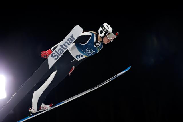 (260207) -- PREDAZZO, Feb. 7, 2026 (Xinhua) -- Weng Yangning of China competes during the first round of the ski jumping women's normal hill individual at the Milan-Cortina 2026 Olympic Winter Games in Predazzo, Italy, Feb. 7, 2026. (Xinhua/Huang Wei)