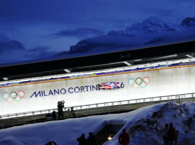 (260207) -- CORTINA D'AMPEZZO, Feb. 7, 2026 (Xinhua) -- Matthew Greiner of the United States competes during the luge men's singles run 1 at the Milan-Cortina 2026 Olympic Winter Games in Cortina, Italy, Feb. 7, 2026. (Xinhua/Li Gang)