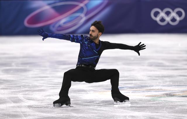 (260207) -- MILAN, Feb. 7, 2026 (Xinhua) -- Kevin Aymoz of France competes during the short program of men single skating for figure skating team event at the Milan-Cortina 2026 Olympic Winter Games in Milan, Italy, Feb. 7, 2026. (Xinhua/Chen Yichen)
