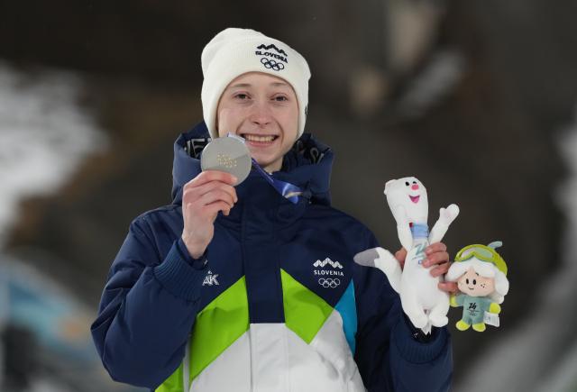 (260207) -- PREDAZZO, Feb. 7, 2026 (Xinhua) -- Silver medalist Nika Prevc of Slovenia poses for a photo during the awarding ceremony of ski jumping women's normal hill individual at the Milan-Cortina 2026 Olympic Winter Games in Predazzo, Italy, Feb. 7, 2026. (Xinhua/Meng Yongmin)