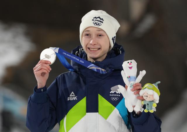 (260207) -- PREDAZZO, Feb. 7, 2026 (Xinhua) -- Silver medalist Nika Prevc of Slovenia poses for a photo during the awarding ceremony of ski jumping women's normal hill individual at the Milan-Cortina 2026 Olympic Winter Games in Predazzo, Italy, Feb. 7, 2026. (Xinhua/Meng Yongmin)