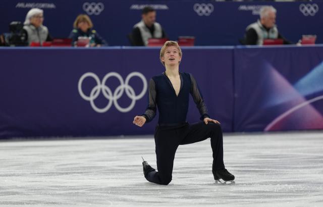 (260207) -- MILAN, Feb. 7, 2026 (Xinhua) -- Daniel Grassl of Italy competes during the short program of men single skating for figure skating team event at the Milan-Cortina 2026 Olympic Winter Games in Milan, Italy, Feb. 7, 2026. (Xinhua/Cheng Min)