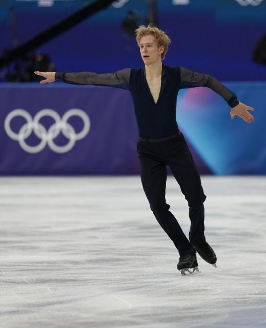 (260207) -- MILAN, Feb. 7, 2026 (Xinhua) -- Daniel Grassl of Italy competes during the short program of men single skating for figure skating team event at the Milan-Cortina 2026 Olympic Winter Games in Milan, Italy, Feb. 7, 2026. (Xinhua/Cheng Min)