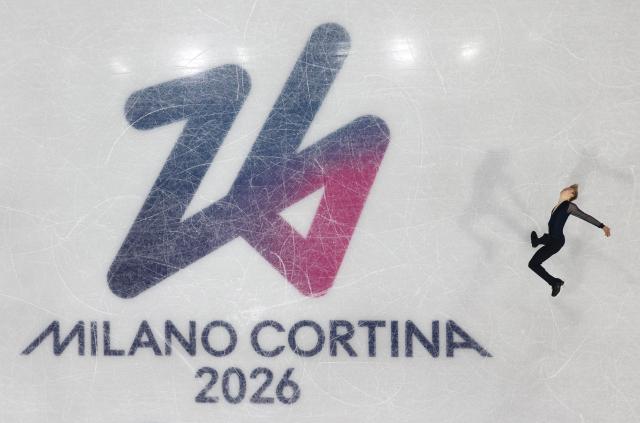 (260207) -- MILAN, Feb. 7, 2026 (Xinhua) -- Daniel Grassl of Italy competes during the short program of men single skating for figure skating team event at the Milan-Cortina 2026 Olympic Winter Games in Milan, Italy, Feb. 7, 2026. (Xinhua/Li Ming)