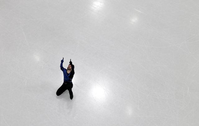 (260207) -- MILAN, Feb. 7, 2026 (Xinhua) -- Kevin Aymoz of France competes during the short program of men single skating for figure skating team event at the Milan-Cortina 2026 Olympic Winter Games in Milan, Italy, Feb. 7, 2026. (Xinhua/Li Ming)