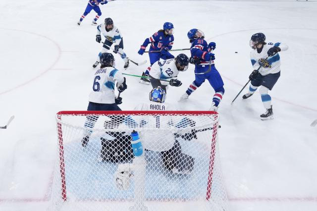 (260207) -- MILAN, Feb. 7, 2026 (Xinhua) -- Hilary Knight (2nd R) of the United States competes during the ice hockey women's preliminary round group A match between the United States and Finland at the Milan-Cortina 2026 Olympic Winter Games in Milan, Italy, Feb. 7, 2026. (Xinhua/Tao Xiyi)