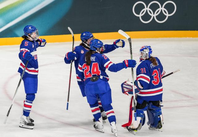 (260207) -- MILAN, Feb. 7, 2026 (Xinhua) -- Players of the United States celebrate after the ice hockey women's preliminary round group A match between the United States and Finland at the Milan-Cortina 2026 Olympic Winter Games in Milan, Italy, Feb. 7, 2026. (Xinhua/Sun Fei)