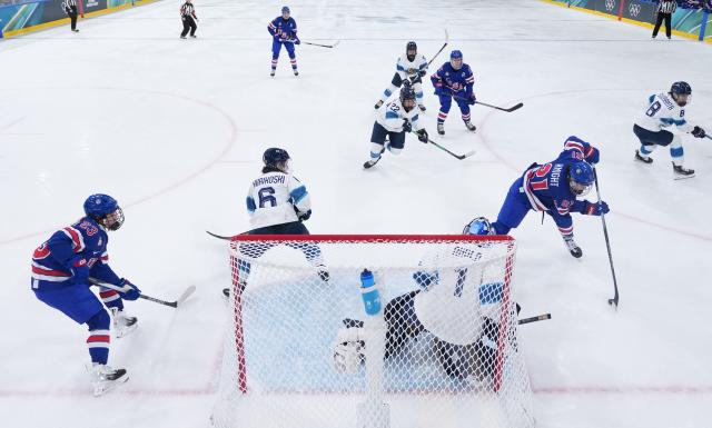 (260207) -- MILAN, Feb. 7, 2026 (Xinhua) -- Hilary Knight (2nd R) of the United States competes during the ice hockey women's preliminary round group A match between the United States and Finland at the Milan-Cortina 2026 Olympic Winter Games in Milan, Italy, Feb. 7, 2026. (Xinhua/Tao Xiyi)