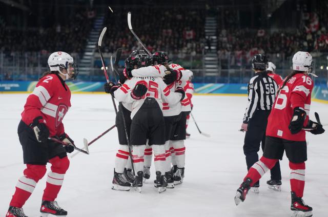 (260207) -- MILAN, Feb. 7, 2026 (Xinhua) -- Players of Canada celebrate during the ice hockey women's preliminary round group A match between Switzerland and Canada at the Milan-Cortina 2026 Olympic Winter Games in Milan, Italy, Feb. 7, 2026. (Xinhua/Tao Xiyi)
