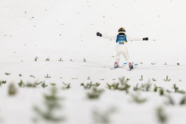 (260208) -- PREDAZZO, Feb. 8, 2026 (Xinhua) -- Nika Prevc of Slovenia competes during the Ski Jumping Women's Normal Hill Individual of the 2026 Milan-Cortina Winter Olympics in Predazzo, Italy, Feb. 7, 2026. (Xinhua/Huang Wei)