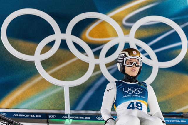 (260208) -- PREDAZZO, Feb. 8, 2026 (Xinhua) -- Maruyama Nozomi of Japan competes during the Ski Jumping Women's Normal Hill Individual of the 2026 Milan-Cortina Winter Olympics in Predazzo, Italy, Feb. 7, 2026. (Xinhua/Huang Wei)