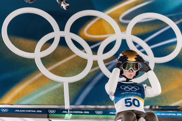 (260208) -- PREDAZZO, Feb. 8, 2026 (Xinhua) -- Nika Prevc of Slovenia competes during the Ski Jumping Women's Normal Hill Individual of the 2026 Milan-Cortina Winter Olympics in Predazzo, Italy, Feb. 7, 2026. (Xinhua/Huang Wei)